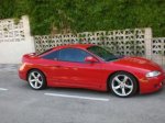 Mitsubishi eclipse rojo doble escape lateral.JPG
