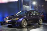 nueva-york-2010-2011-subaru-wrx-sti-sed-n-tiene-alas-las-necesidades-de-las-ruedas-de-oro-890.jpg