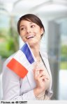 feliz-mujer-joven-sosteniendo-una-bandera-francesa-adult-pixmac-foto-48126577.jpg