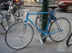 Blue_fixed-gear_(track)_bicycle_locked_up.jpg