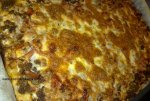 pizza casera queso carne picada bacon tomate.jpg