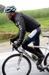 Chris-Horner-tambi&#233;n-abandon&#243;-por-la-lluvia.jpg