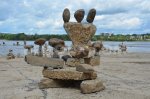 1345582488-artists-create-unique-rock-sculptures-along-ottawa-river_1400757.jpg