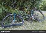 depositphotos_210477524-stock-photo-broken-bike-in-a-park.jpg