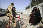 23britishsoldieronbikeinbasra.jpg